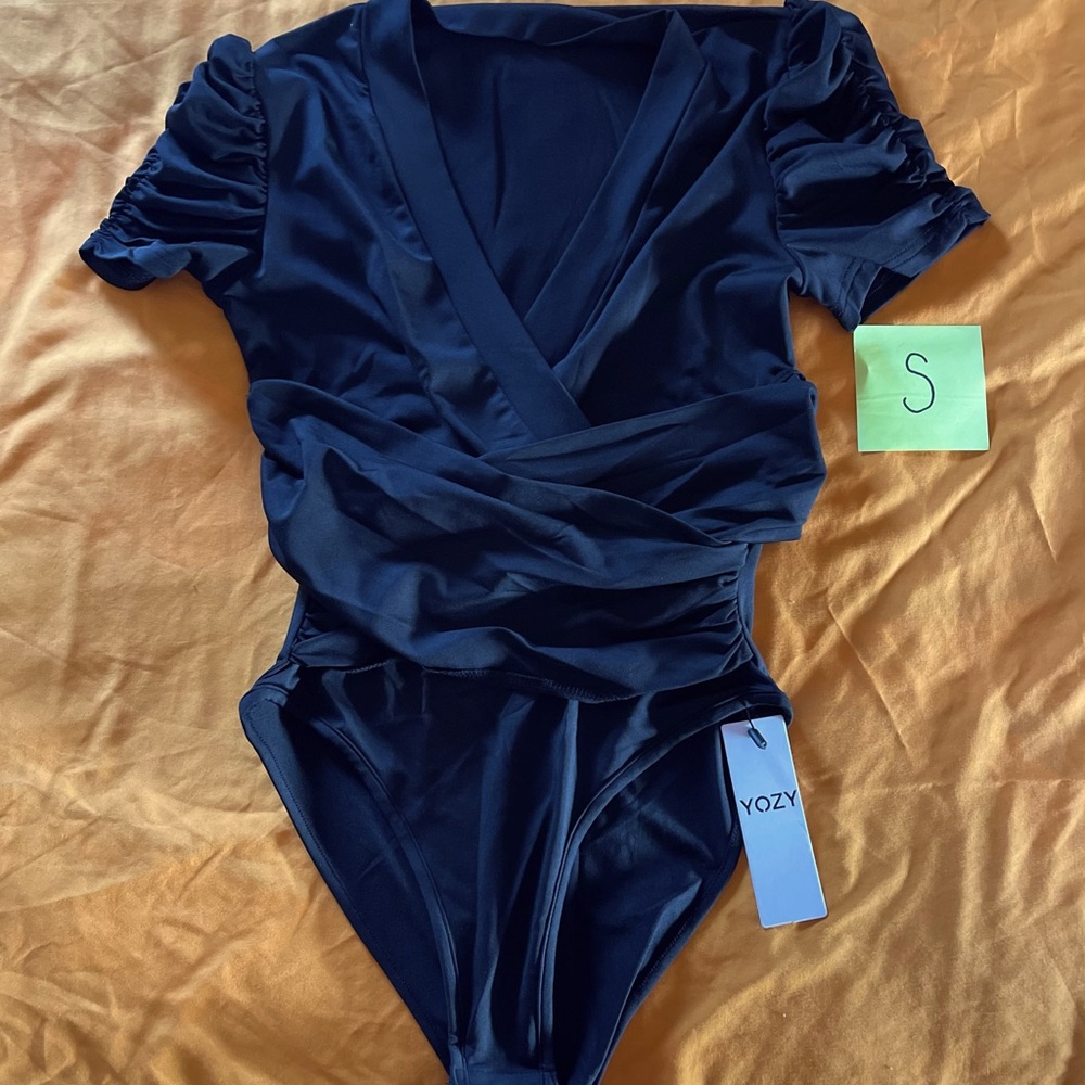 Woman’s top bodysuit Small New with Tags
